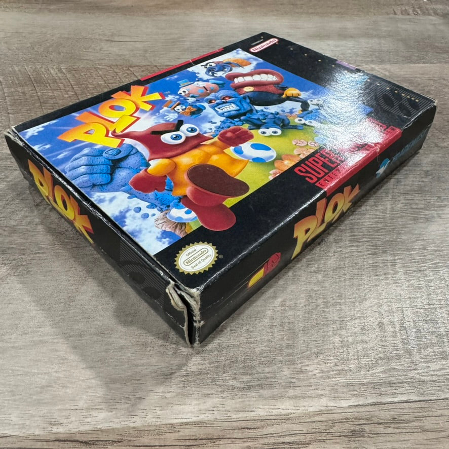 Plok (Super Nintendo, SNES 1993) Complete W/ Nice Box, Crispy Cart & Manual!