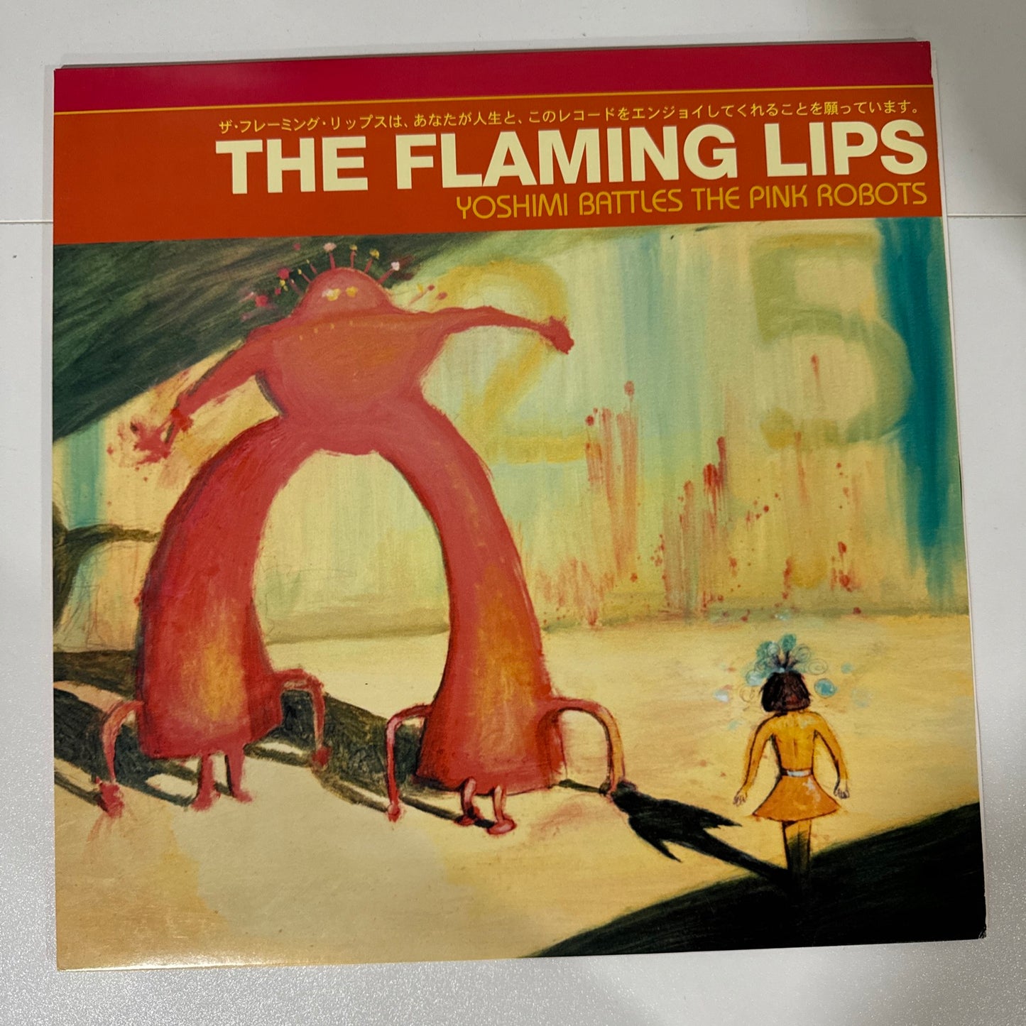 Yoshimi Battles the Pink Robots by Flaming Lips (Record, 2012)